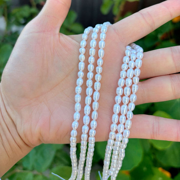 14 Inch Natural A+ Grade Lustrous Teardrop Oval Rice Pearl Beads, White Cultured Freshwater Pearls, 4-5mm, Hole ID 0.7mm, PB2-45