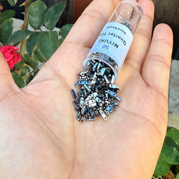 10g Miyuki Quarter Tila Seed Beads 5x1.2mm, Opaque Light Gunmetal (QTL-464)