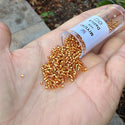30g Miyuki Delica 11/0 Seed Beads, Transparent Silver-Lined Marigold DB1201