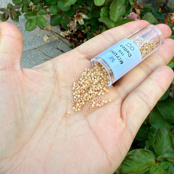 30g Miyuki Delica 11/0 Seed Beads, Translucent 24Kt Gold-Lined Opal DB230