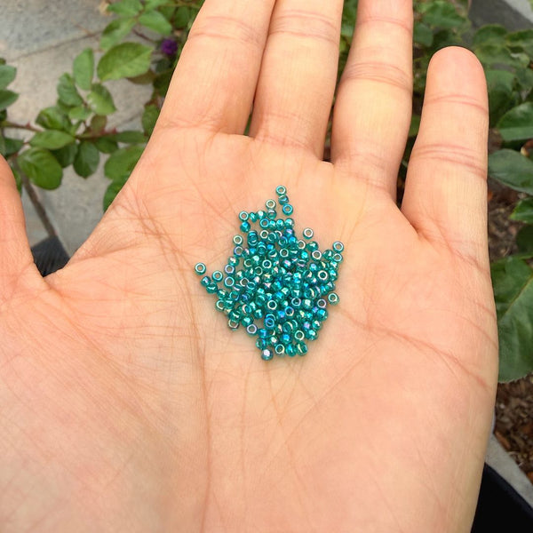 25g Miyuki Rocaille 11/0 Round Seed Beads Translucent Rainbow Teal RR-2458