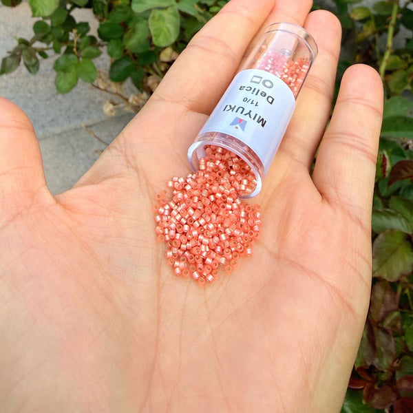 7.5g Miyuki Delica 11/0 Seed Beads, Translucent Silver-Lined Peach DB622