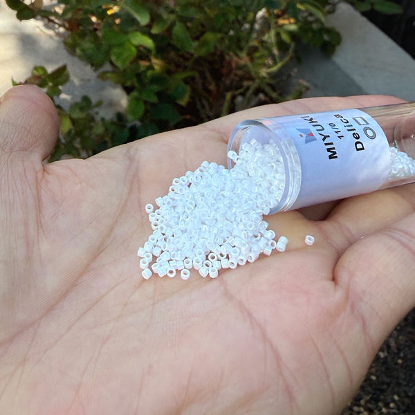 30g Miyuki Delica 11/0 Seed Beads, Opaque Rainbow White Pearl DB202