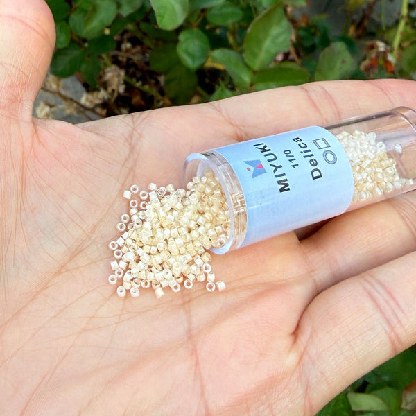 7.5g Miyuki Delica 11/0 Seed Beads, Ivory-Lined Luster Crystal Clear DB2371