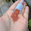 7.5g Miyuki Delica 11/0 Seed Beads, Opaque Rainbow Glazed Persimmon DB2274