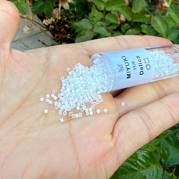 30g Miyuki Delica 11/0 Seed Beads, Silk Satin Rainbow Crystal White DB670