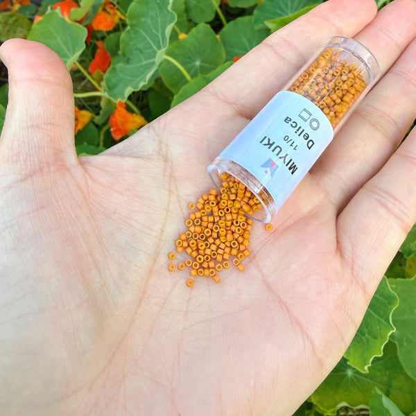 30g Miyuki Delica 11/0 Seed Beads, Opaque Pumpkin DB653
