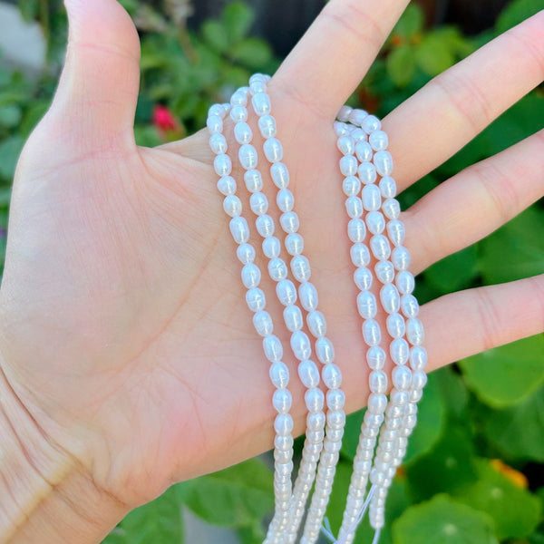 14 Inch Natural A+ Grade Lustrous Teardrop Oval Rice Pearl Beads, White Cultured Freshwater Pearls, 4-5mm, Hole ID 0.7mm, PB2-45