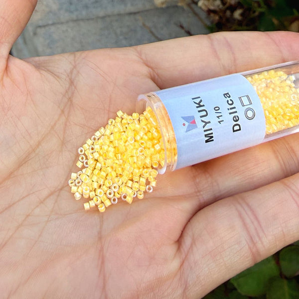 7.5g Miyuki Delica 11/0 Seed Beads, Translucent Luminous Sun Glow DB2032
