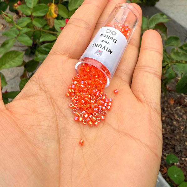 30g Miyuki Delica 10/0 Tube Seed Beads, Opaque Rainbow Orange DBM161
