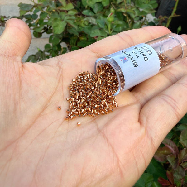 30g Miyuki Delica 11/0 Seed Beads Transparent Copper-Lined Pale Amber DB181
