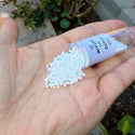 7.5g Miyuki Delica 11/0 Seed Beads, Opaque Rainbow White Pearl DB202