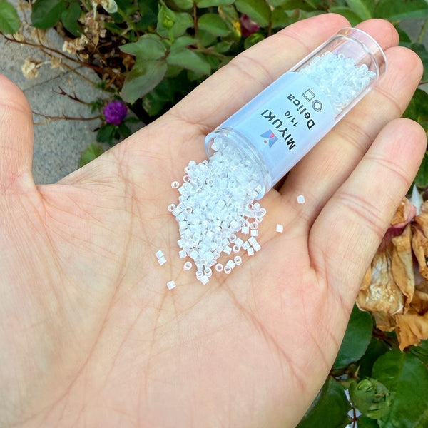 30g Miyuki Delica 11/0 Seed Beads, Silk Satin Rainbow Crystal White DB670
