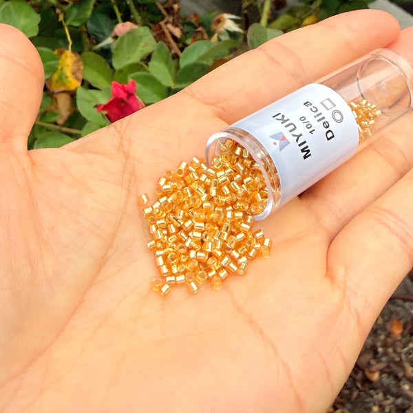 7.5g Miyuki Delica 10/0 Tube Seed Beads Transparent Silver-lined Gold DBM42