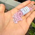 10g Miyuki Half Tila Seed Beads 5x2.3mm, Opaque Luster Rose (HTL-599)