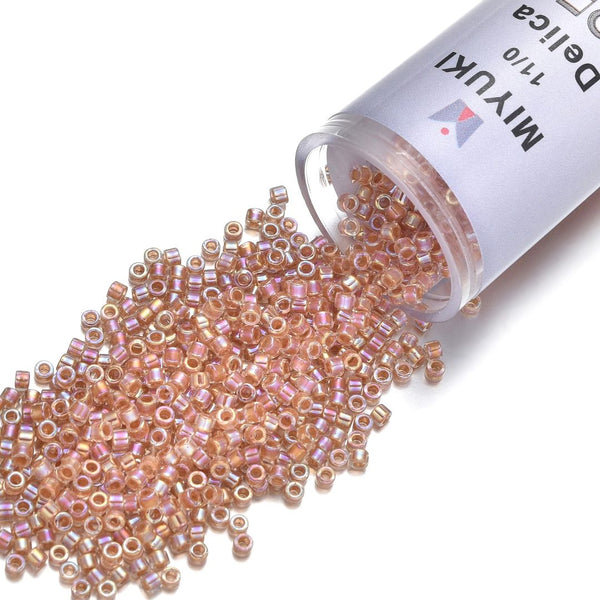 30g Miyuki Delica 11/0 Seed Beads, Peach-Lined Rainbow Crystal Clear DB54