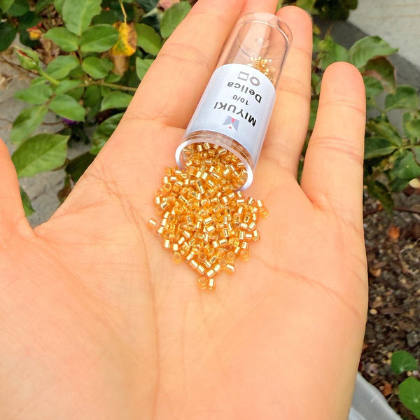 30g Miyuki Delica 10/0 Tube Seed Beads, Transparent Silver-lined Gold DBM42