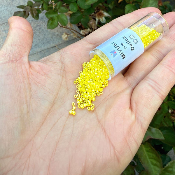 7.5g Miyuki Delica 11/0 Seed Beads, Opaque Rainbow Yellow DB160