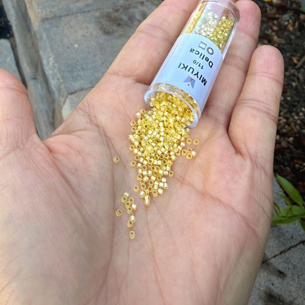 30g Miyuki Delica 11/0 Seed Beads, Translucent Silver-Lined Jonquil DB623
