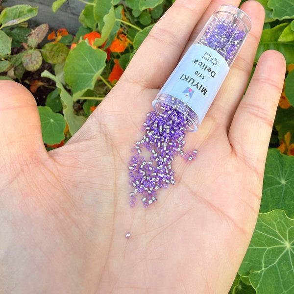 7.5g Miyuki Delica 11/0 Seed Beads, Transparent Silver Lined Purple DB1347