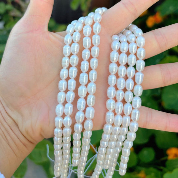 14 Inch Natural A+ Grade Lustrous Teardrop Oval Rice Pearl Beads, White Cultured Freshwater Pearls, 6-7mm, Hole ID 0.7mm, PB2-67