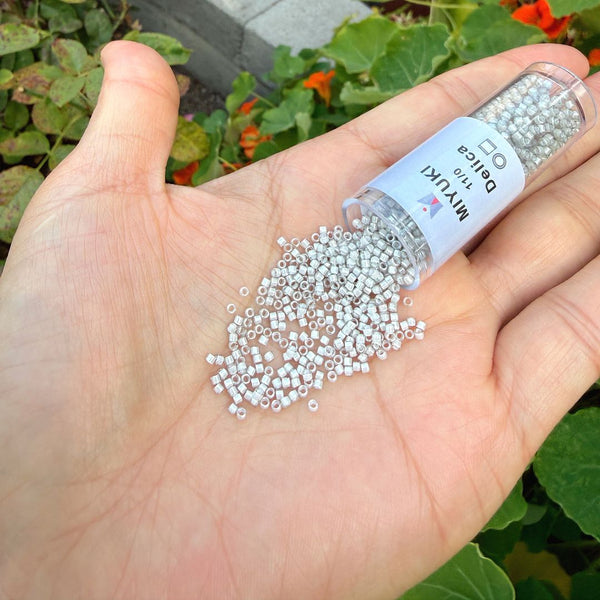7.5g Miyuki Delica 11/0 Seed Beads, Moonstone lined Crystal Clear DB2391