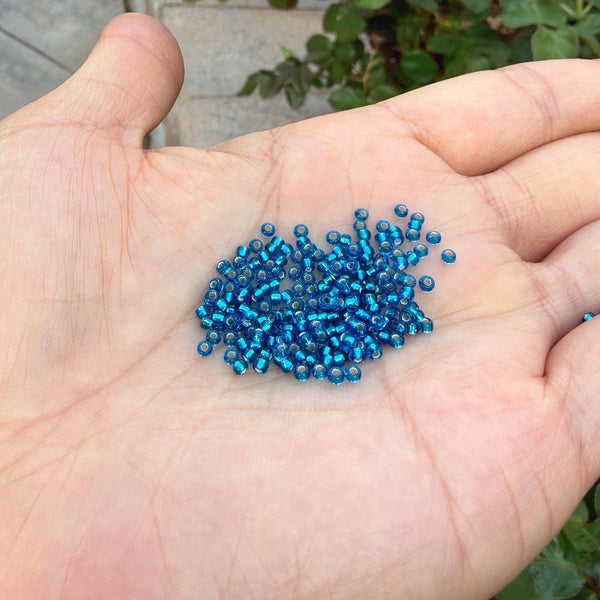 25g Miyuki Rocaille 11/0 Round Seed Beads Silver-lined Capri Blue RR-25